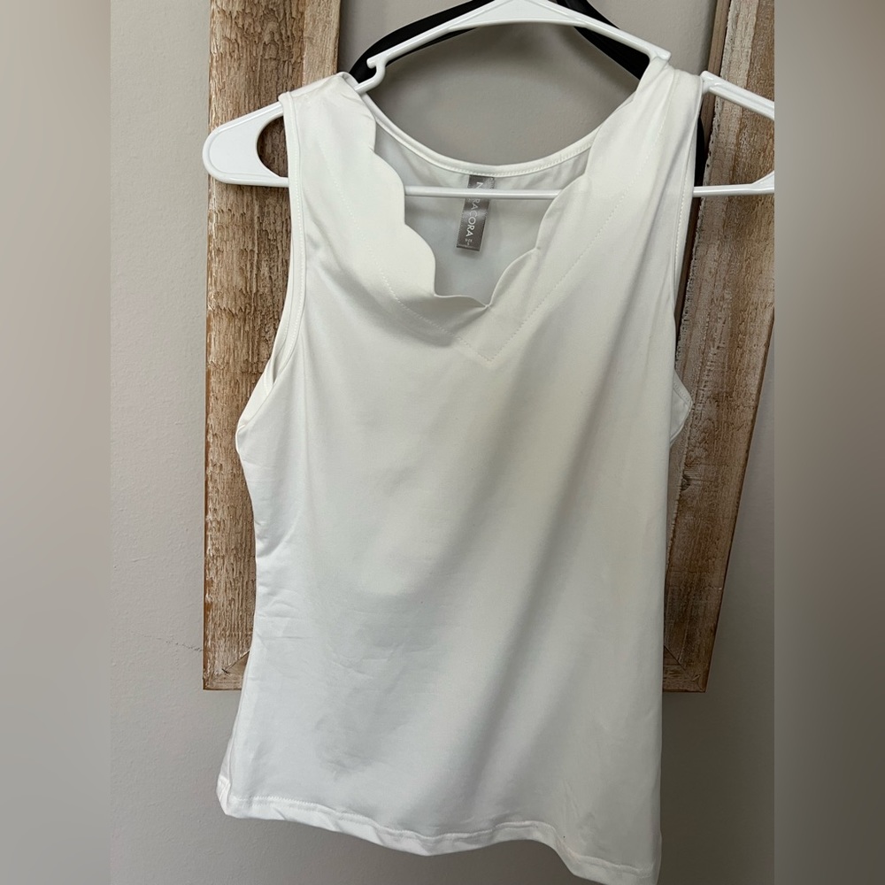 White scalloped top